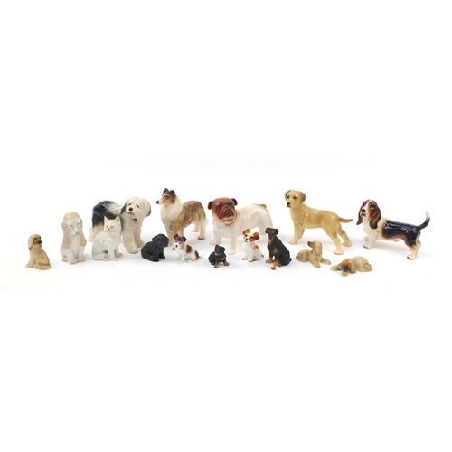 1558 - Porcelain dogs including Coppercraft and Melba ware together with one other, the largest 20.5cm in l... 