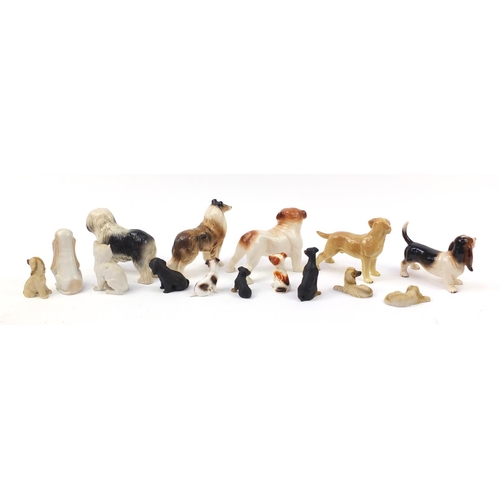 1558 - Porcelain dogs including Coppercraft and Melba ware together with one other, the largest 20.5cm in l... 