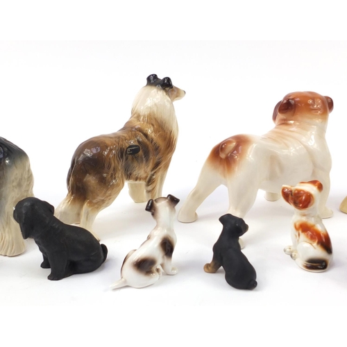 1558 - Porcelain dogs including Coppercraft and Melba ware together with one other, the largest 20.5cm in l... 