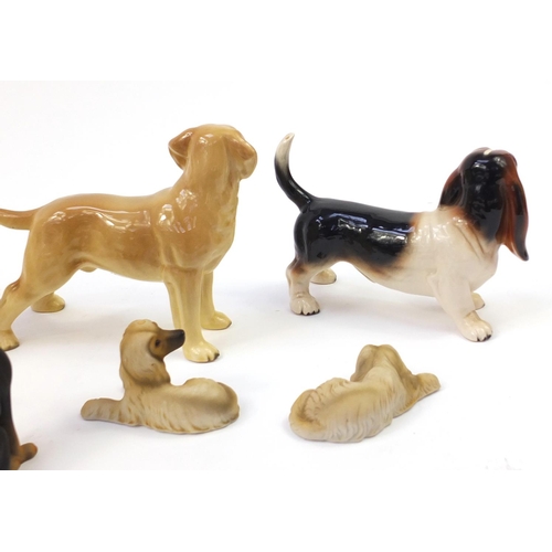 1558 - Porcelain dogs including Coppercraft and Melba ware together with one other, the largest 20.5cm in l... 