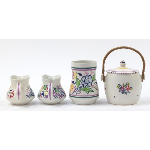 1524 - Poole Pottery including vases, each hand painted with flowers, the largest 26cm high