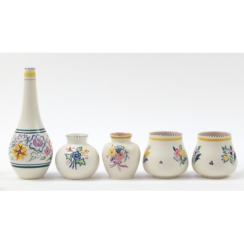 1524 - Poole Pottery including vases, each hand painted with flowers, the largest 26cm high