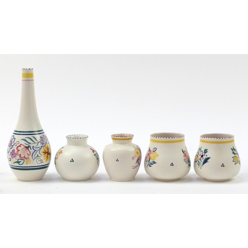 1524 - Poole Pottery including vases, each hand painted with flowers, the largest 26cm high