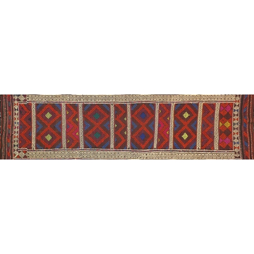 1602 - Rectangular Turkish Kilim carpet having an all over geometric design, 252cm x 70cm