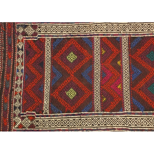 1602 - Rectangular Turkish Kilim carpet having an all over geometric design, 252cm x 70cm