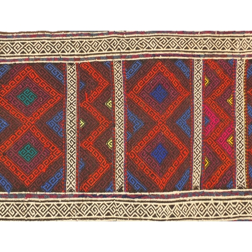 1602 - Rectangular Turkish Kilim carpet having an all over geometric design, 252cm x 70cm