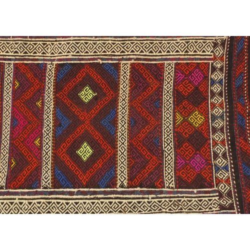 1602 - Rectangular Turkish Kilim carpet having an all over geometric design, 252cm x 70cm