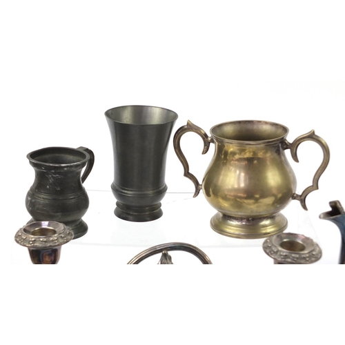 1529 - Metalware including a pair of brass candlesticks and silver plated cruet stand with glass bottles, t... 