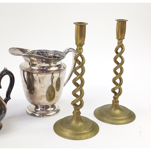 1529 - Metalware including a pair of brass candlesticks and silver plated cruet stand with glass bottles, t... 