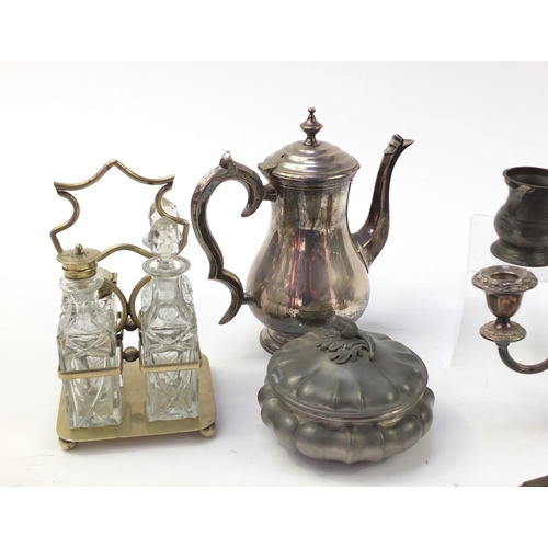 1529 - Metalware including a pair of brass candlesticks and silver plated cruet stand with glass bottles, t... 