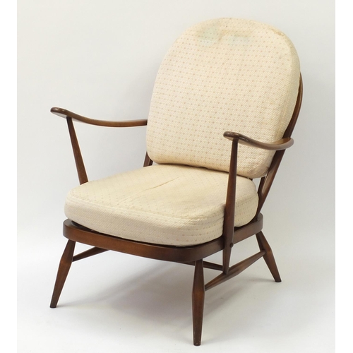 1605 - Ercol elm stick back armchair, 81cm high