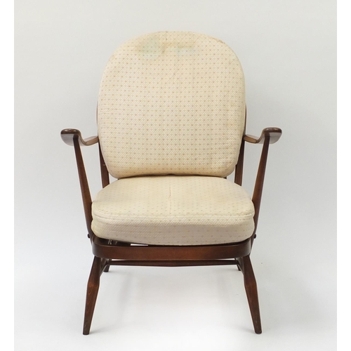 1605 - Ercol elm stick back armchair, 81cm high