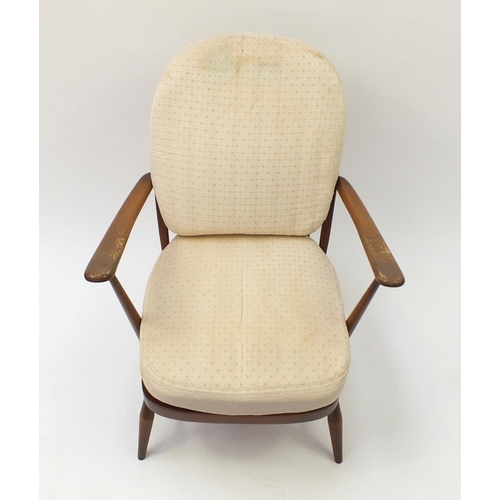 1605 - Ercol elm stick back armchair, 81cm high