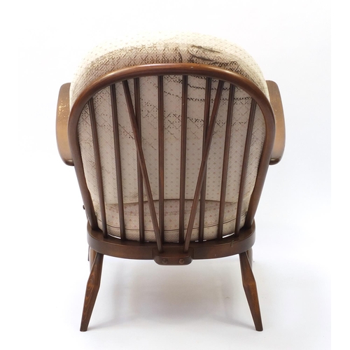 1605 - Ercol elm stick back armchair, 81cm high