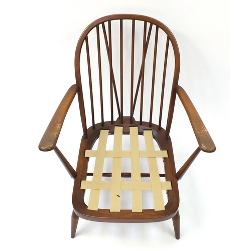 1605 - Ercol elm stick back armchair, 81cm high