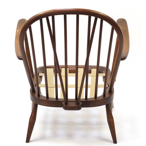 1605 - Ercol elm stick back armchair, 81cm high