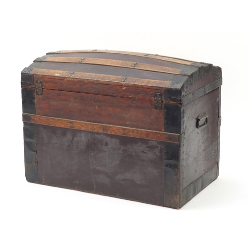 1593 - Victorian wooden bound dome top travelling trunk with carrying handles, 56cm H x 75.5cm W x 46cm D