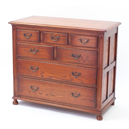 1607 - Oak seven drawer chest fitted with five short above two long drawers, 69cm H x 90cm W x 45cm D