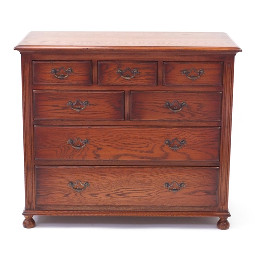 1607 - Oak seven drawer chest fitted with five short above two long drawers, 69cm H x 90cm W x 45cm D