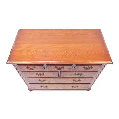 1607 - Oak seven drawer chest fitted with five short above two long drawers, 69cm H x 90cm W x 45cm D