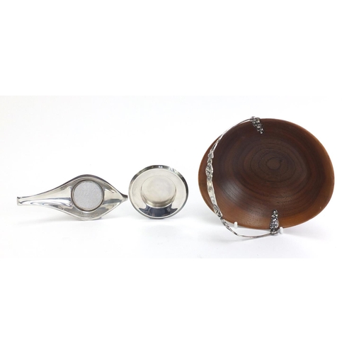 459 - Modernist Continental silver tea strainer on stand, and teak basket with 800 grade silver swing hand... 