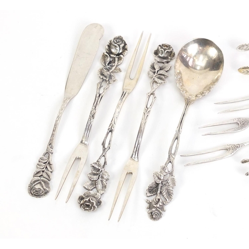 462 - German 800 grade silver cutlery including forks and sugar tongs, housed in a WMS boxes, the largest ... 