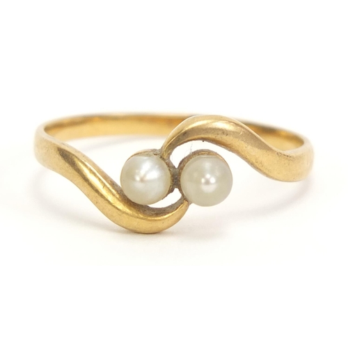 1059 - Unmarked gold pearl crossover ring, size N, 1.36g