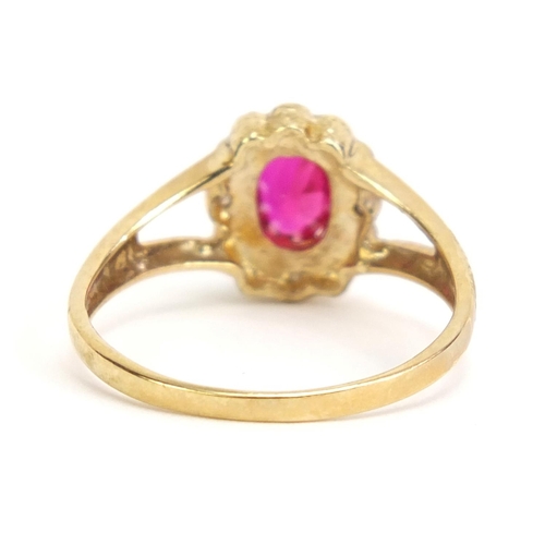 1009 - 9ct gold ruby and diamond ring, size L, 2.0g