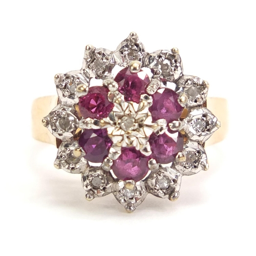 1055 - 9ct gold ruby and diamond three tier ring, size L, 4.6g