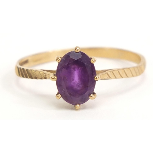 1015 - 9ct gold amethyst solitaire ring, size M, 1.1g