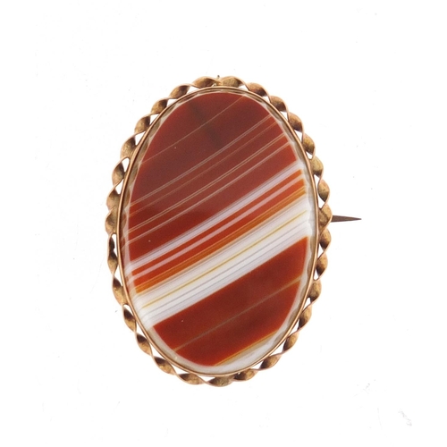 144 - Unmarked gold agate brooch, 3.6cm in length, 10.2g