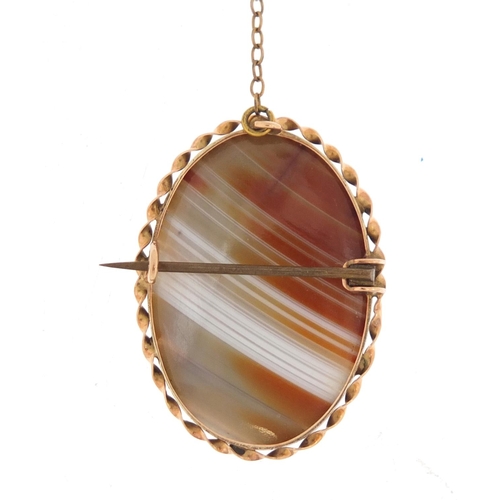 144 - Unmarked gold agate brooch, 3.6cm in length, 10.2g