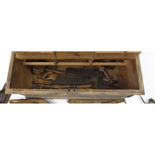 1616 - Victorian pine tool chest housing Victorian and later tools including planes, saws and chisels