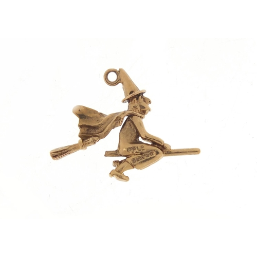 1102 - 9ct gold witch on a broomstick charm, 2.3cm in length, 2.3g