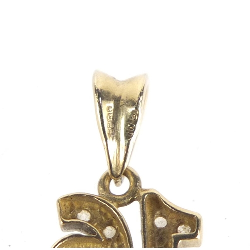 1012 - 9ct gold 16th birthday charm, 1.8cm in length, 1.3g