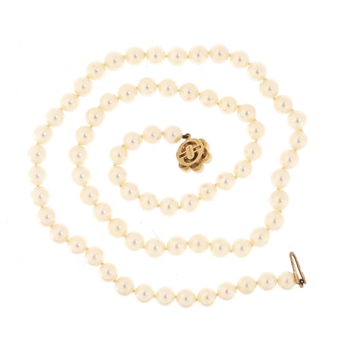 1141 - Cultured pearl necklace with 9ct gold clasp, 50cm in length, 34.3g