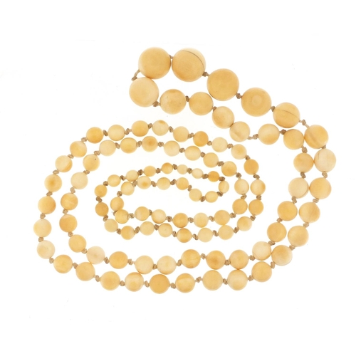 1150 - Graduated ivory bead necklace, 120cm in length, 91.2g