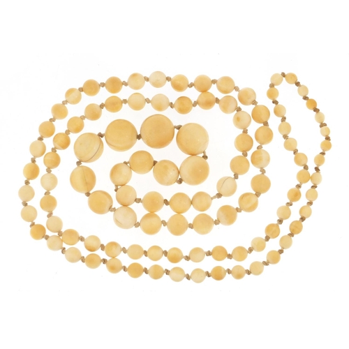 1150 - Graduated ivory bead necklace, 120cm in length, 91.2g