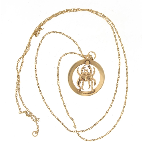 791 - 9ct gold zodiac Cancer pendant, 2.5cm in diameter, 2.1g, on an unmarked gold necklace, 2.5g