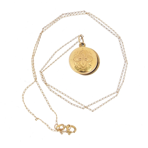 964 - 9ct gold circular locket on a 9ct gold necklace, the locket 1.2cm in diameter, 1.5g