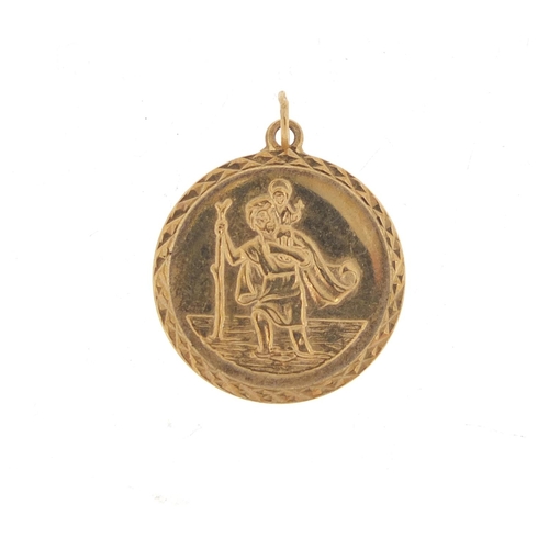 962 - 9ct gold St Christopher pendant, 1.9cm in diameter, 1.2g