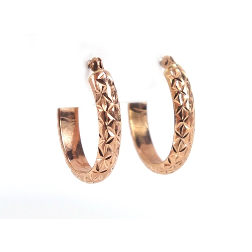 960 - Pair of gold coloured metal hoop earrings, 1.6cm in length, 0.6g