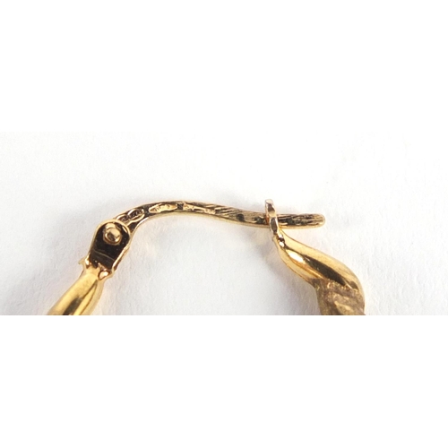 1008 - Pair of 9ct gold hoop earrings, 2.4cm in length, 1.6g