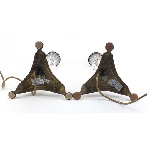 886 - Pair of ornate brass table lamps with paw feet and cut glass columns, each 49cm high