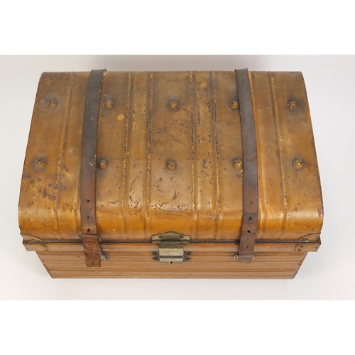 1560 - Metalware comprising a vintage trunk, brass footman, military tin helmet and two Indian trays, the l... 