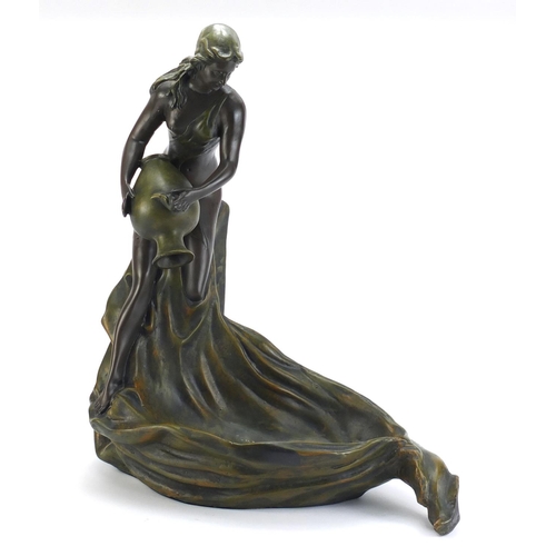 889 - Art Nouveau design centrepiece in the form of a maiden holding a vessel, 53cm high