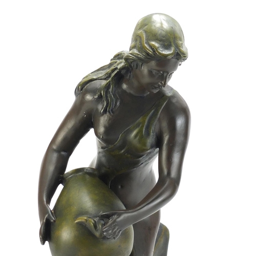 889 - Art Nouveau design centrepiece in the form of a maiden holding a vessel, 53cm high