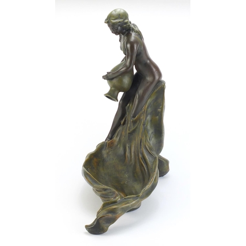 889 - Art Nouveau design centrepiece in the form of a maiden holding a vessel, 53cm high