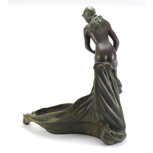 889 - Art Nouveau design centrepiece in the form of a maiden holding a vessel, 53cm high