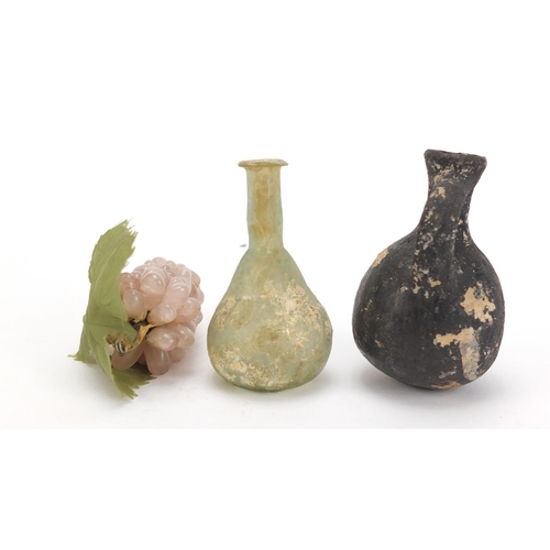 532 - Roman style Glass and terracotta vessels together with a Chinese hardstone bunch of grapes, the larg... 